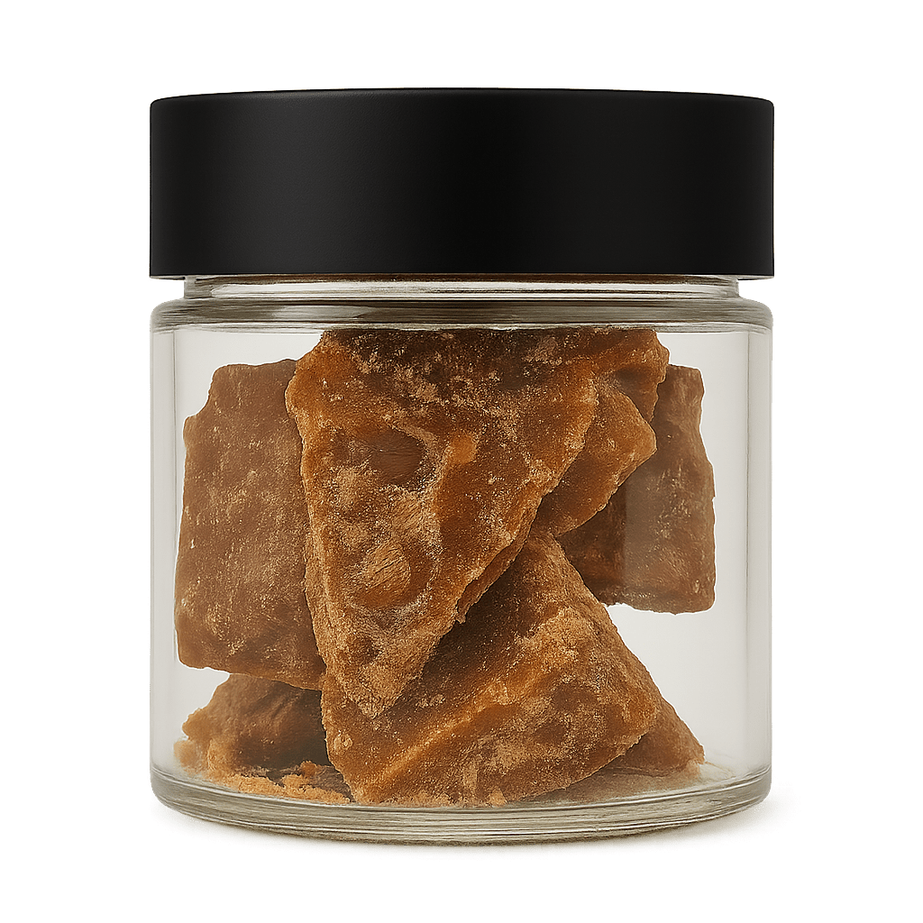 Glass jar with black lid containing crystalized CBG distillate