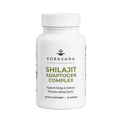A white bottle of Korasana Shilajit Adaptogen Complex dietary supplement, featuring a white cap and a clean white label with green and black text, set against a light gray background.